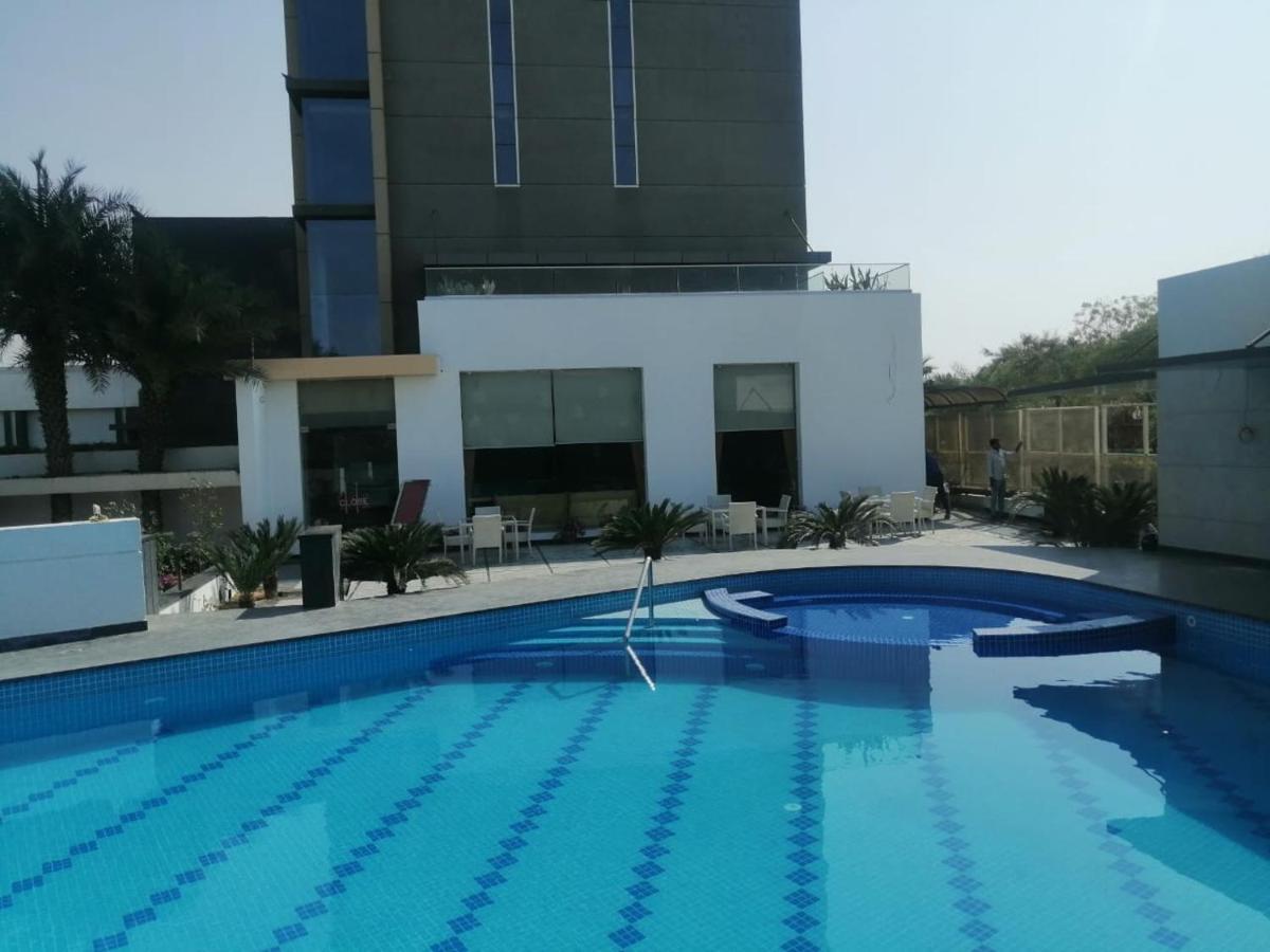 Hotel Kasturi Orchid Pāl Kültér fotó